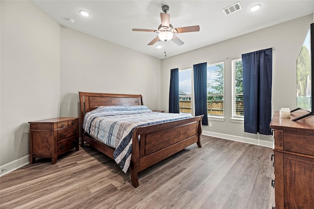 2922 Muhley St, Katy, TX 77493 - bedroom featuring light wood finished floors, a ceiling fan, and recessed lighting