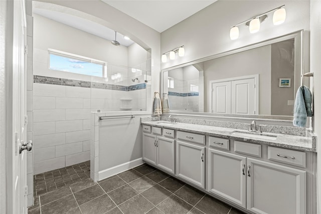 2922 Muhley St, Katy, TX 77493 - bathroom featuring double vanity, walk in shower, and tile patterned floors
