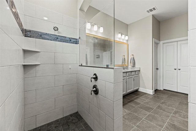 2922 Muhley St, Katy, TX 77493 - full bath featuring a tile shower, vanity, and tile patterned floors