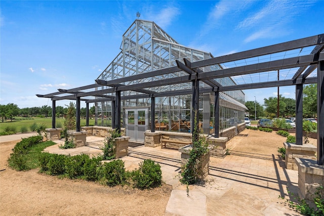 2922 Muhley St, Katy, TX 77493 - surrounding community featuring an exterior structure, a pergola, and an outbuilding