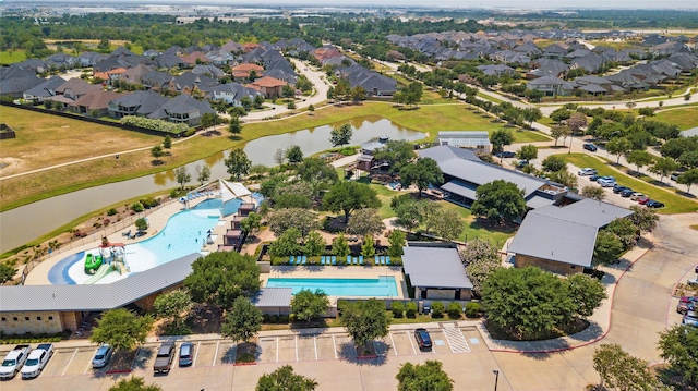 2922 Muhley St, Katy, TX 77493 - aerial perspective of suburban area featuring a pool area and a large body of water