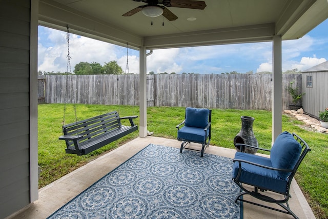 8023 Royal Palm Dr, Fulshear, TX 77441 - fenced backyard featuring ceiling fan and a patio area