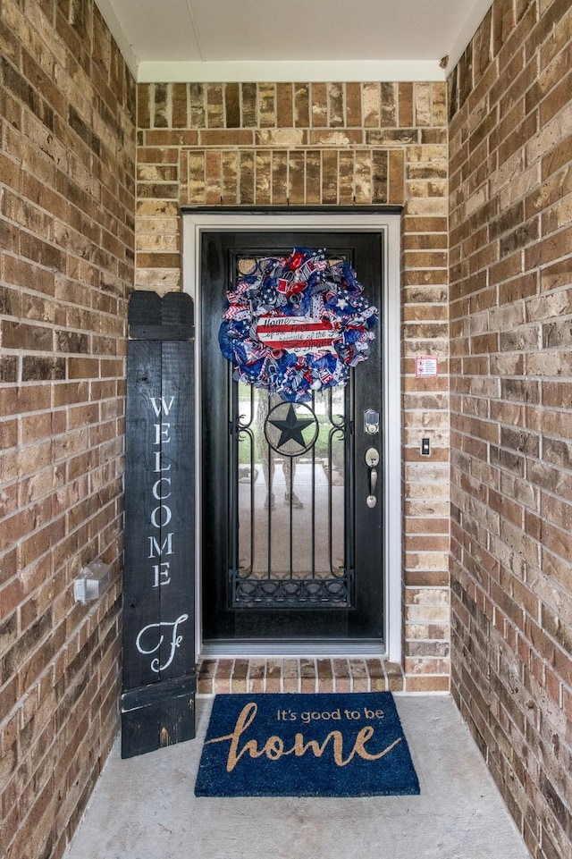 8023 Royal Palm Dr, Fulshear, TX 77441 - view of exterior entry featuring brick siding