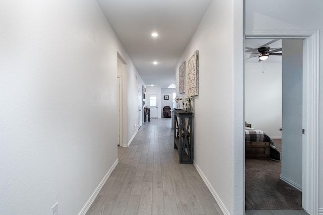 8023 Royal Palm Dr, Fulshear, TX 77441 - corridor with light wood finished floors and recessed lighting