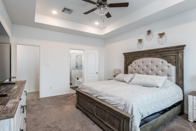 8023 Royal Palm Dr, Fulshear, TX 77441 - bedroom with carpet floors, a raised ceiling, recessed lighting, a ceiling fan, and ensuite bath