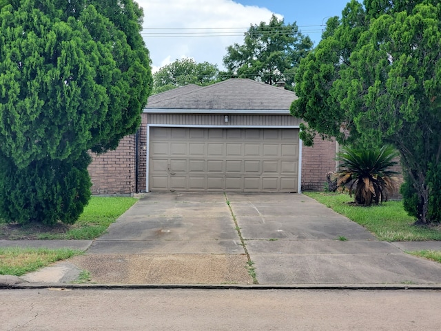 9206 Beringwood Dr, Houston, TX 77083 - garage with concrete driveway