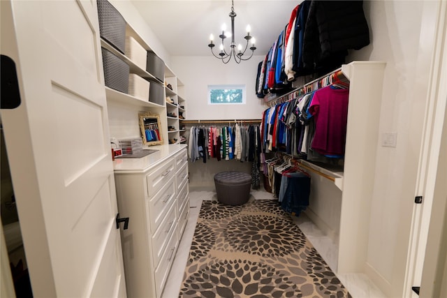 14646 Whistling Oak Dr, Conroe, TX 77356 - walk in closet with a chandelier
