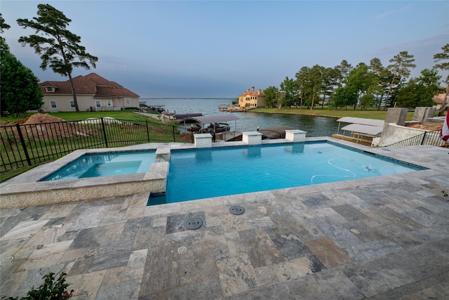 14646 Whistling Oak Dr, Conroe, TX 77356 - view of swimming pool with a water view, a patio, and a pool with connected hot tub