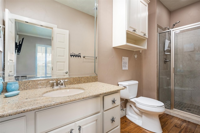 973 Kenlyn Dr, Crystal Beach, TX 77650 - full bath with wood finished floors, vanity, and a stall shower
