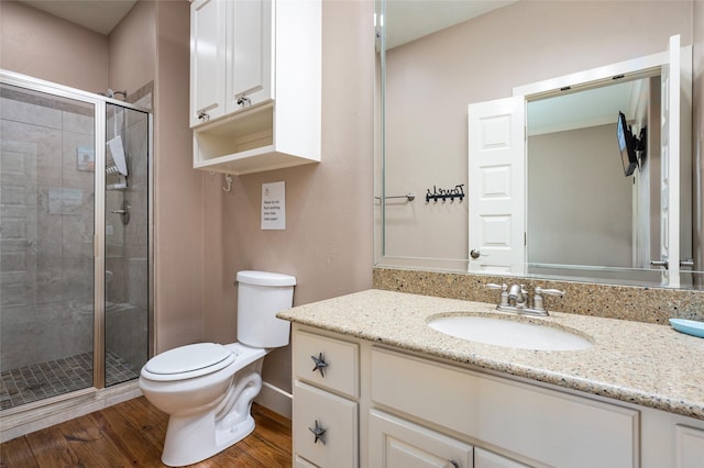 973 Kenlyn Dr, Crystal Beach, TX 77650 - full bathroom with vanity, a stall shower, and wood finished floors
