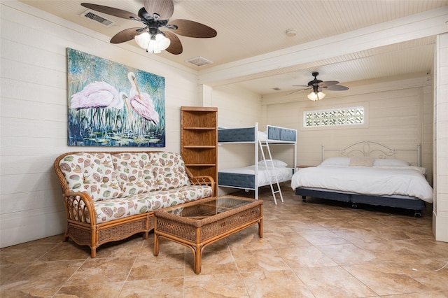 973 Kenlyn Dr, Crystal Beach, TX 77650 - bedroom featuring wood walls, beam ceiling, and a ceiling fan