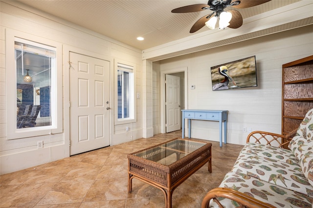 973 Kenlyn Dr, Crystal Beach, TX 77650 - living room featuring ceiling fan, wood walls, and recessed lighting