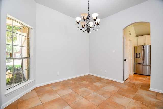 3511 Sweetspire Rd, Katy, TX 77449 - spare room with arched walkways and a chandelier