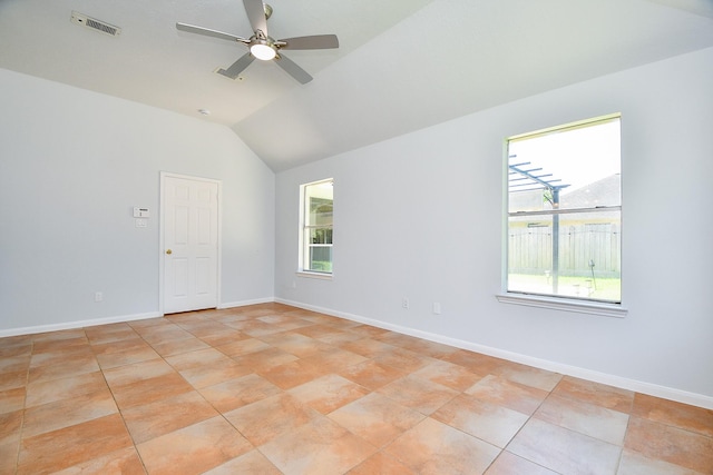 3511 Sweetspire Rd, Katy, TX 77449 - spare room with vaulted ceiling, ceiling fan, and light tile patterned floors