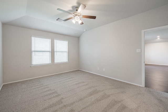 11526 Gingerland Dr, Conroe, TX 77304 - carpeted empty room with a ceiling fan and vaulted ceiling