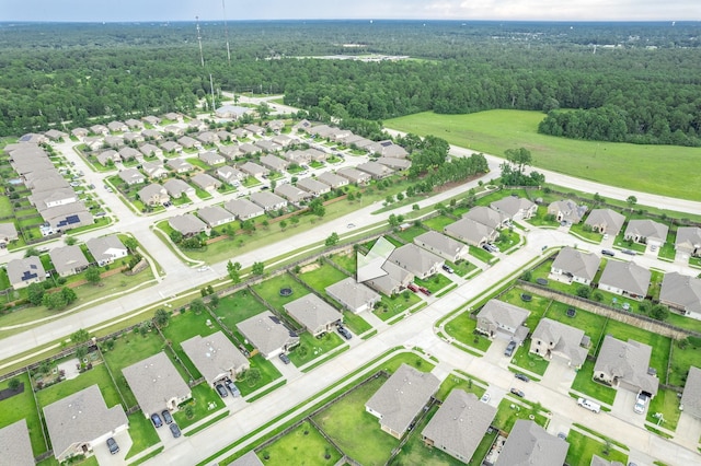 11526 Gingerland Dr, Conroe, TX 77304 - aerial perspective of suburban area with a forest