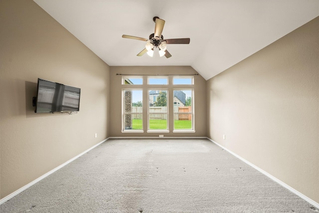1303 Paradise Creek Ln, Rosenberg, TX 77471 - empty room featuring vaulted ceiling, a ceiling fan, and carpet floors