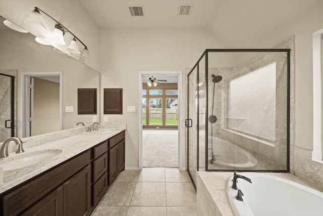 1303 Paradise Creek Ln, Rosenberg, TX 77471 - full bath with a bath, a stall shower, double vanity, a ceiling fan, and tile patterned flooring