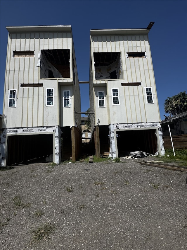 1804 65th St Unit A, Galveston, TX 77551 - view of front of house featuring a garage and driveway