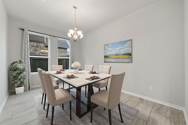 11103 Larkspur Dale Ct, Houston, TX 77044 - dining area with a chandelier and baseboards
