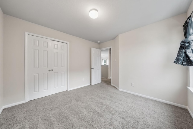 11103 Larkspur Dale Ct, Houston, TX 77044 - unfurnished bedroom featuring carpet flooring and a closet