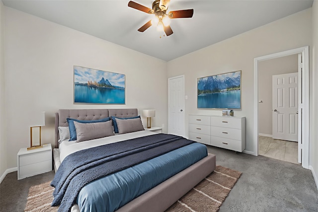 11103 Larkspur Dale Ct, Houston, TX 77044 - carpeted bedroom featuring baseboards and ceiling fan