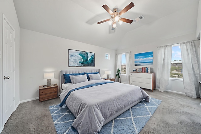 11103 Larkspur Dale Ct, Houston, TX 77044 - carpeted bedroom with multiple windows, lofted ceiling, and ceiling fan