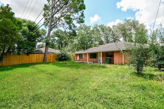 4114 Lemac Dr, Houston, TX 77025 - rear view of house featuring brick siding