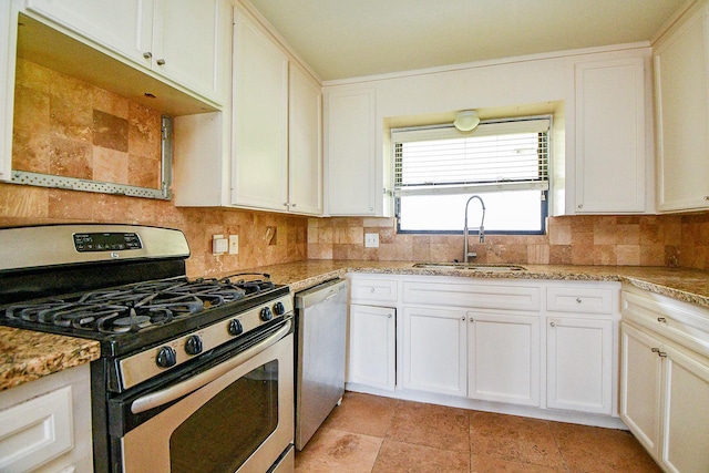 4114 Lemac Dr, Houston, TX 77025 - kitchen featuring stainless steel appliances, tasteful backsplash, white cabinets, and light stone counters