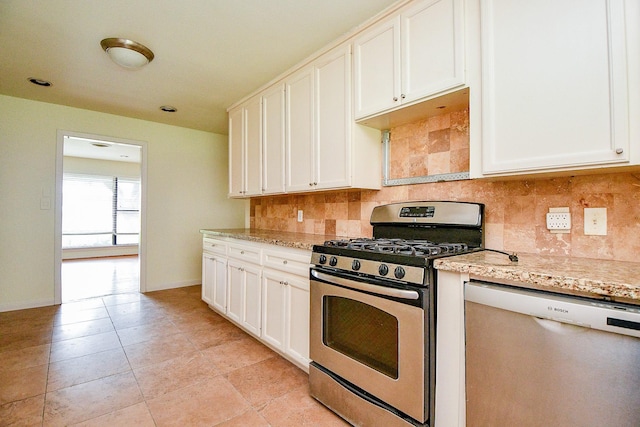 4114 Lemac Dr, Houston, TX 77025 - kitchen featuring stainless steel gas range, dishwashing machine, tasteful backsplash, light stone countertops, and white cabinets