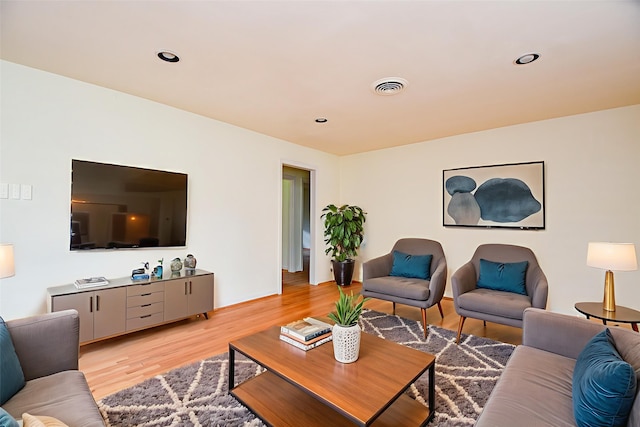 4114 Lemac Dr, Houston, TX 77025 - living room featuring light wood-style flooring and recessed lighting
