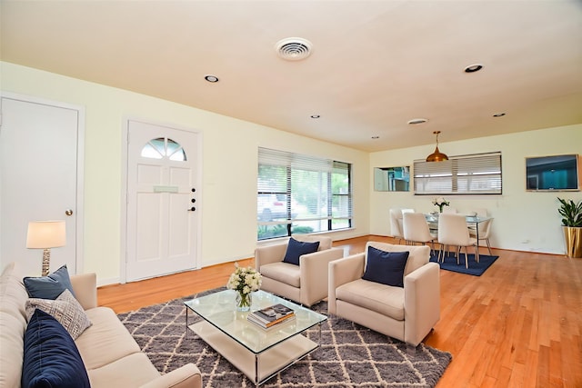 4114 Lemac Dr, Houston, TX 77025 - living room featuring light wood finished floors and recessed lighting