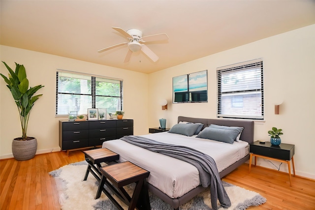 4114 Lemac Dr, Houston, TX 77025 - bedroom featuring light wood-type flooring and ceiling fan