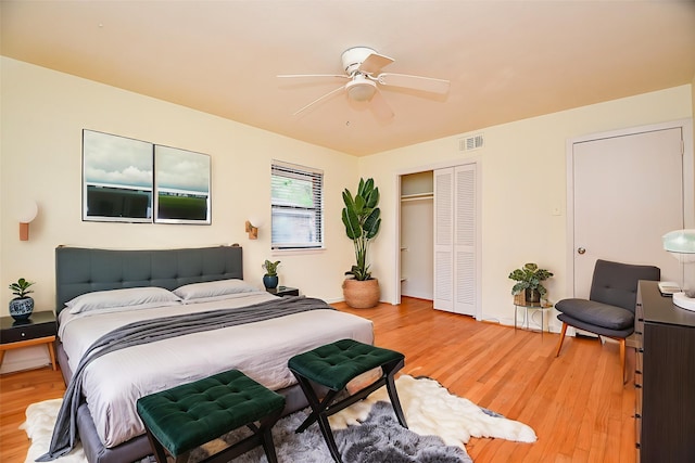 4114 Lemac Dr, Houston, TX 77025 - bedroom with light wood finished floors, a closet, and ceiling fan
