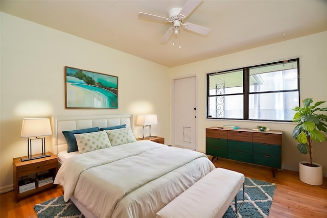 4114 Lemac Dr, Houston, TX 77025 - bedroom with wood finished floors and a ceiling fan