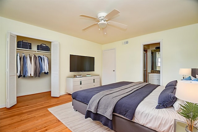 4114 Lemac Dr, Houston, TX 77025 - bedroom featuring light wood-style floors, a closet, and ceiling fan