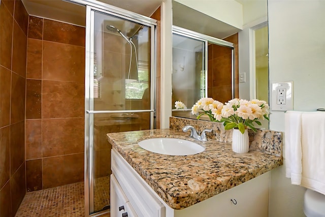 4114 Lemac Dr, Houston, TX 77025 - bathroom featuring vanity and a shower stall
