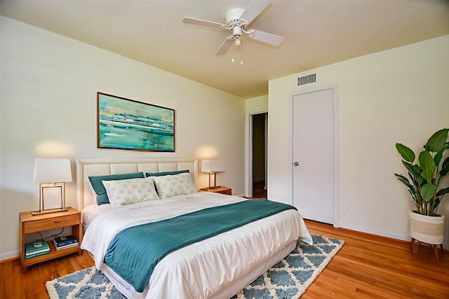 4114 Lemac Dr, Houston, TX 77025 - bedroom featuring wood finished floors and a ceiling fan