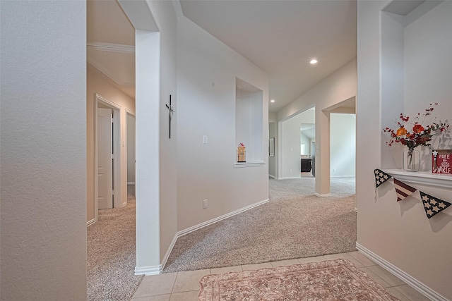406 Riesling Dr, Alvin, TX 77511 - corridor with light colored carpet, light tile patterned floors, and recessed lighting