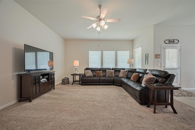 406 Riesling Dr, Alvin, TX 77511 - living area with plenty of natural light, a ceiling fan, and light carpet