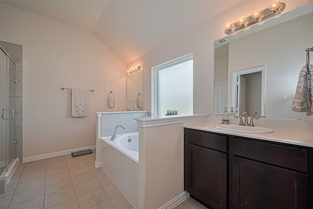 406 Riesling Dr, Alvin, TX 77511 - bathroom with a stall shower, vanity, a bath, tile patterned flooring, and vaulted ceiling