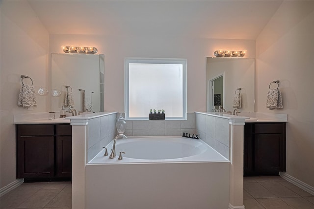 406 Riesling Dr, Alvin, TX 77511 - full bath with tile patterned floors, a bath, and two vanities
