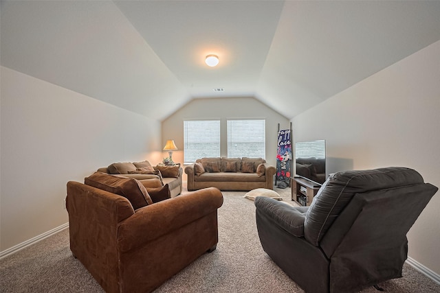 406 Riesling Dr, Alvin, TX 77511 - carpeted living room featuring vaulted ceiling and baseboards