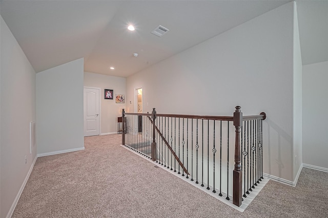 406 Riesling Dr, Alvin, TX 77511 - hall with an upstairs landing, carpet flooring, vaulted ceiling, and recessed lighting