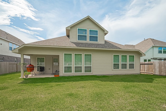 406 Riesling Dr, Alvin, TX 77511 - rear view of property featuring a patio, roof with shingles, and a fenced backyard
