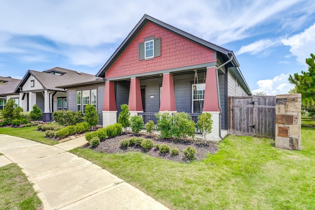 28723 Eden Creek Trl, Fulshear, TX 77441 - craftsman-style home featuring covered porch and a gate
