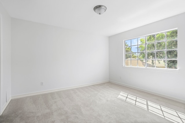 4919 Glen Hollow St, Sugar Land, TX 77479 - carpeted spare room with baseboards