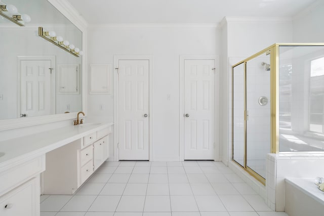 4919 Glen Hollow St, Sugar Land, TX 77479 - full bathroom with vanity, a bath, a shower stall, ornamental molding, and tile patterned floors