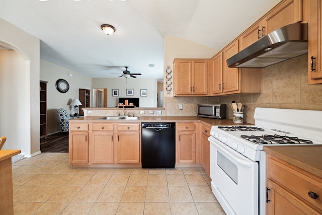 7238 Cypress Prairie Dr, Cypress, TX 77433 - kitchen featuring dishwasher, gas range gas stove, under cabinet range hood, stainless steel microwave, and a peninsula
