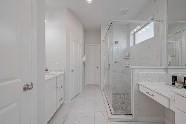 8934 Stanley Oak Dr, Missouri City, TX 77459 - bathroom with marble look tile flooring, vanity, and a shower stall